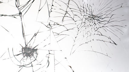 Cracked glass on a white background texture