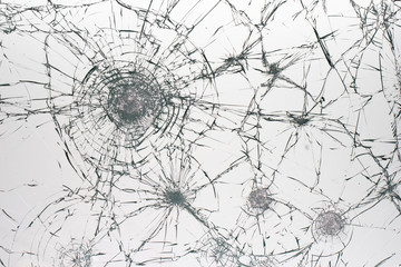 Cracked glass on a white background texture