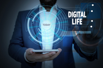 Conceptual hand writing showing Digital Life. Concept meaning Living in a world interconnected through Internet Multimedia Male wear formal suit presenting presentation smart device
