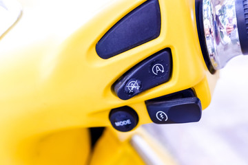 Detail of the control switch of an electric motorcycle.
