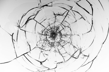 Obraz premium Cracked glass on a white background texture