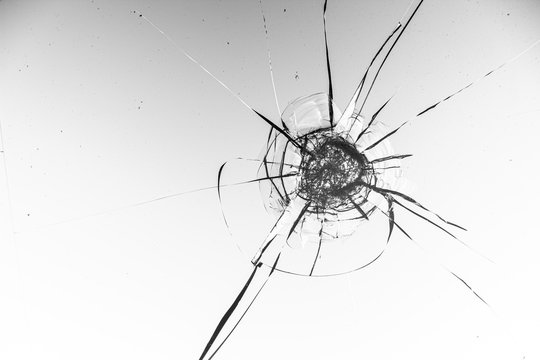 Cracked glass on a white background texture