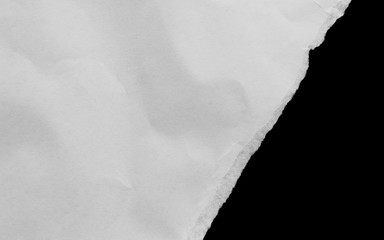 pieces of torn paper texture on black background