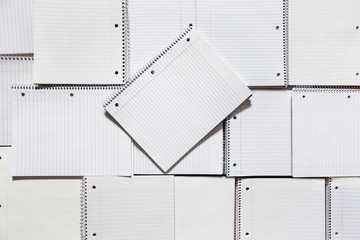 Flat lay image of spiral notebooks from above with shadow
