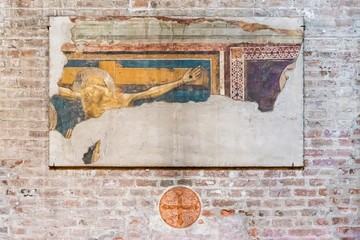 Ruins of medieval painting showing the crucifixion of Jesus