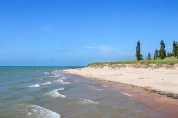 Beach on Lake Michigan, a large portion is gone due to high water and erosion