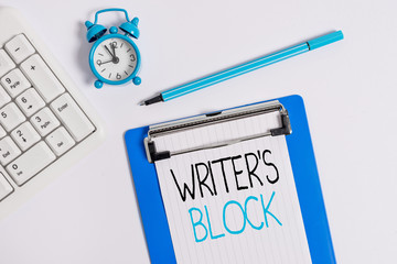 Conceptual hand writing showing Writer S Block. Concept meaning Condition of being unable to think of what to write Flat lay above table with clock pc keyboard and note paper