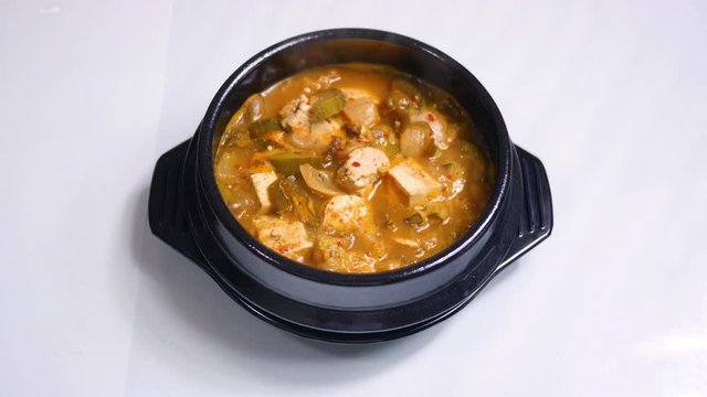 Korean food : Doenjangjjigae is prepared by boiling tofu with various vegetables such as potato and zucchini in various types of broth, including beef, dried anchovy and shellfish, with Doenjang.