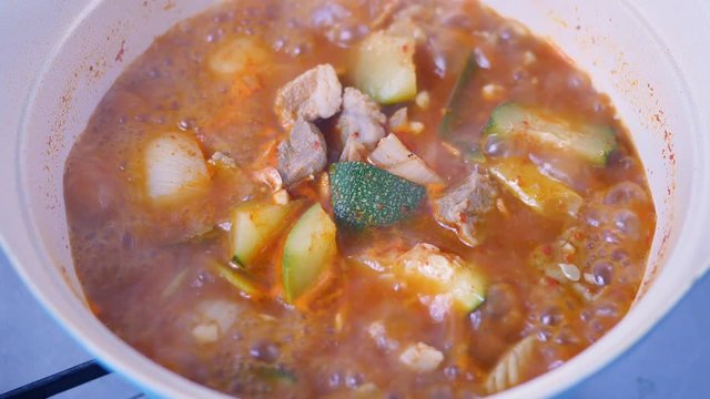 Korean food : Hobakgochujangjjigae.This is a meat and vegetable stew in water or anchovy stock and seasoned with gochujang.