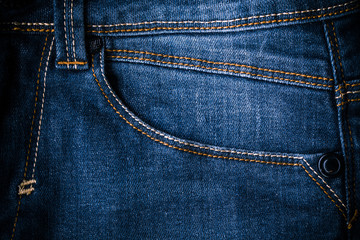 Fototapeta premium Retro color tone of blue denim jeans fabric texture for background website fashion design or backdrop product.
