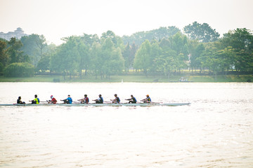 Putrajaya, Malaysia - September 6, 2019 : Dragon boat racer practice at the lake near Taman Botani.
