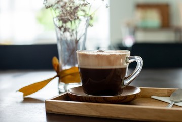 a cup of chocolate milk, a cup of hot chocolate, hot chocolate