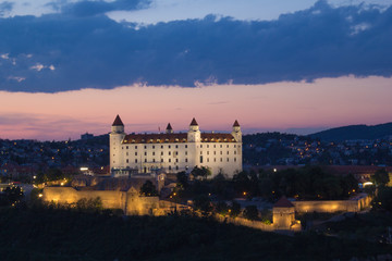 Beautiful view of the Bratislava castle on the banks of the Danube in the old town of Bratislava, Slovakia on a sunny summer day.