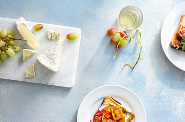 Snacks for wine of bruschetta, cheese and grapes