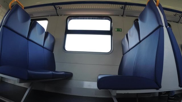 empty seats in the train, the train in motion.