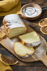 Homemade cottage cheese pie on a wooden table. Traditional dessert. Rustic style