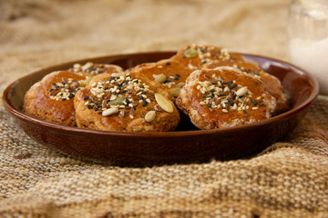 homemade honey cookies with seeds on a plate. tea time. Sweet treat for the holiday