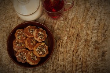 homemade honey cookies with seeds on a plate. tea time. Sweet treat for the holiday. Place under the inscription