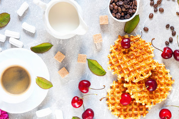 Coffee, milk and wafers.