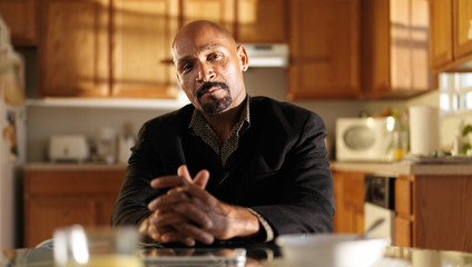 portrait of african american man in kitchen