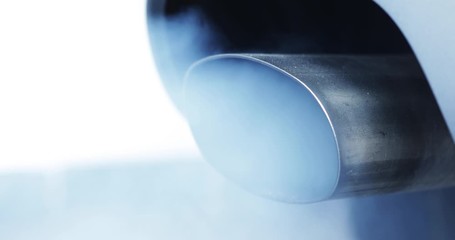 Air pollution smoke from car exhaust pipe. Shot in 4k resolution