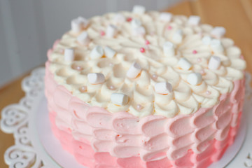 pink cake with marshmallows