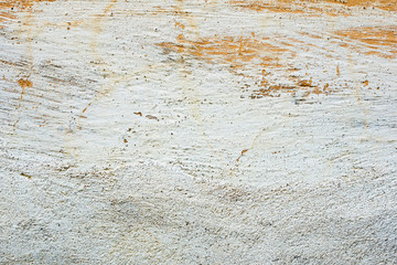 Texture of a concrete wall with cracks and scratches which can be used as a background