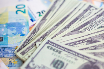 Obraz na płótnie Canvas Euro money with us dollar bill compettition background