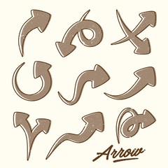 Obraz premium Vector hand drawn arrows symbol elements for your design with splash and letter arrow