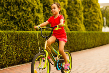 little girl with her bicycle