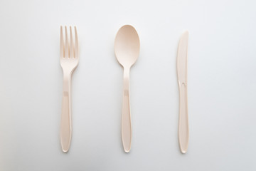 Biodegradable plastic spoon, fork and lunch box on white background isolate