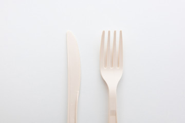 Biodegradable plastic spoon, fork and lunch box on white background isolate