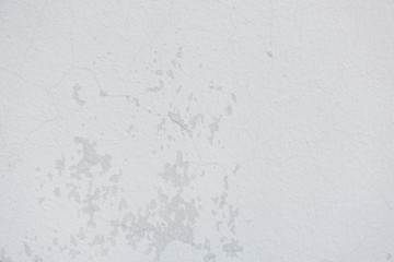 Cracked painted concrete wall background and texture