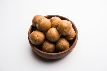 Churma Ladoo / atta laddoo / wheat flour laddu made using ghee and jaggery or sugar. selective focus