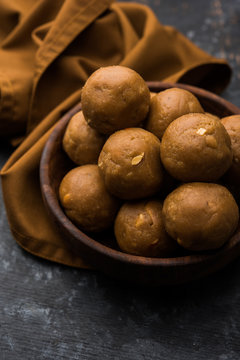 Churma Ladoo / atta laddoo / wheat flour laddu made using ghee and jaggery or sugar. selective focus