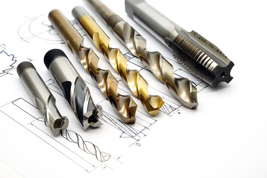 Professional cutting tools used for metalwork. Multi-flute drill, broach bit, Stainless Drill bit, Tap for thread