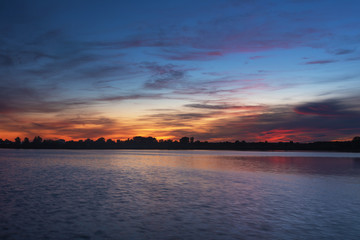 Fototapeta premium Morning scenery on a cozy lake with beautiful fogs