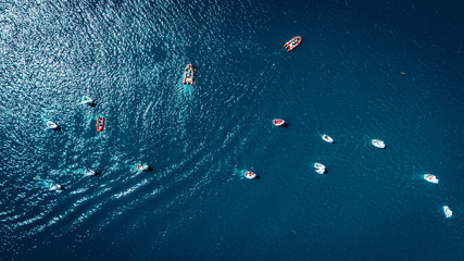 Top view of regatta of small boats on the lake