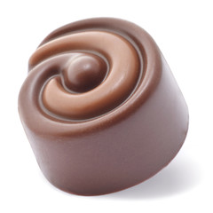 Sweet chocolate candy from dark and milk chocolate closed up isolated on white