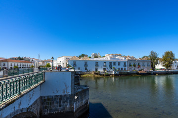 Beautiful sunny day with clear sky in Tavira viewed from Roman Bridge (Puente Romano), Algarve, Portugal