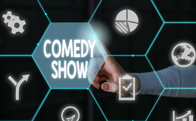 Word writing text Comedy Show. Business photo showcasing Funny program Humorous Amusing medium of Entertainment Male human wear formal work suit presenting presentation using smart device