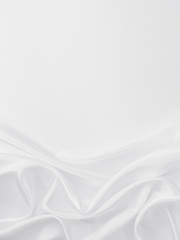 Beautiful smooth elegant wavy white satin silk luxury cloth fabric texture, abstract background design. Copy space. Wedding, engagement concept.