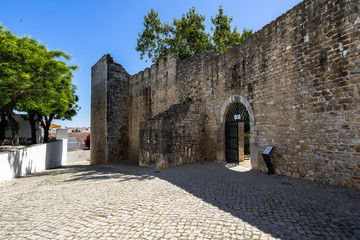 Entrance of the medieval Tavira Castle (Castelo de Tavira), one of the most visited attraction of...