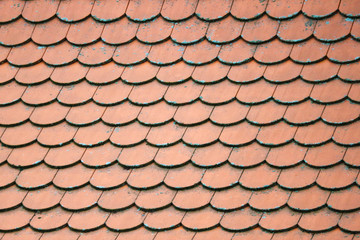 old castle red roof tiles close up