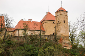 Fototapeta na wymiar Medieval Veveri castle near Brno, Czech republic in autumn forest