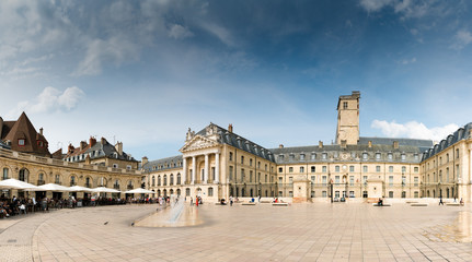 view of the Place de La Liberacion Square in the heart of the old town of Dijon with people dining out in the many restaurants - obrazy, fototapety, plakaty