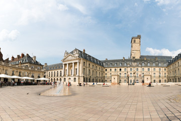 view of the Place de La Liberacion Square in the heart of the old town of Dijon with people dining out in the many restaurants