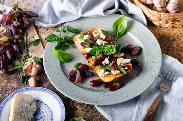 Fresh tomato bruschetta with blue cheese