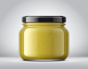 Glass Jar with Mustard on Background. 