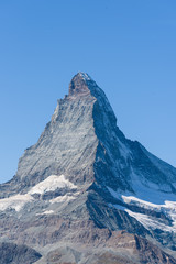 Close-up of the peak from the mountain Matterhorn, Zermatt, Valais, Switzerland, on a perfect summer day, no clouds, blue sky